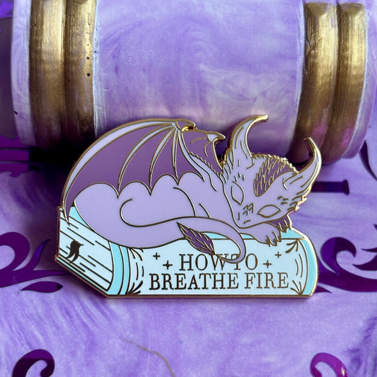 Baby Sleeping Dravon Bookstack Pin Badge. How to breathe fire.