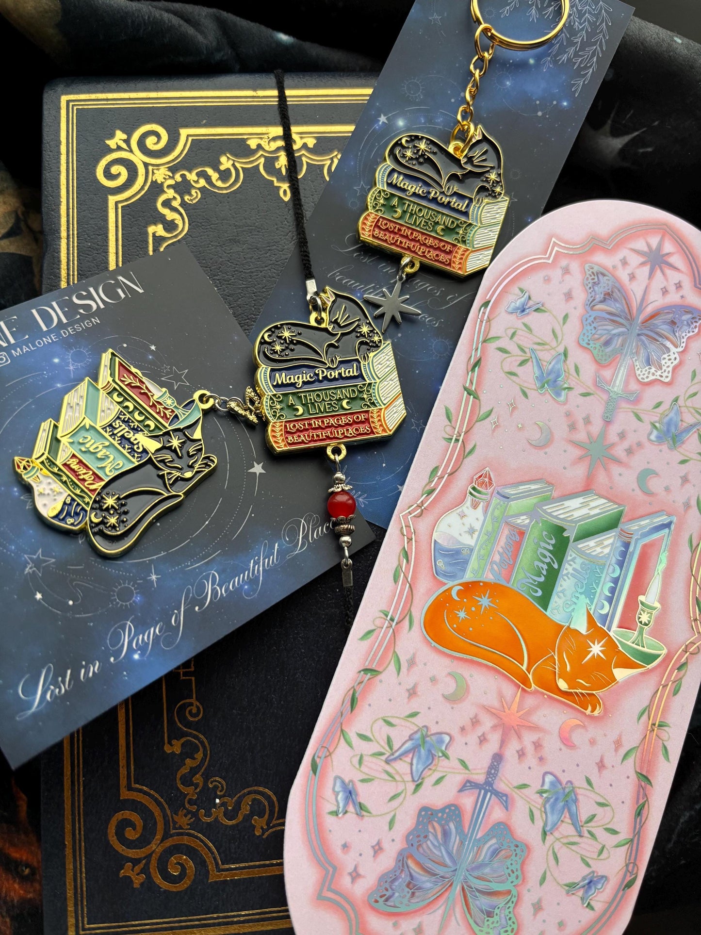 Cat Bookstack Magic Collection Bookmark. Pink holographic foiled bookmark with ginger cat.